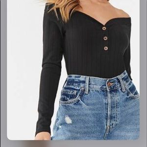 Button from bodysuit